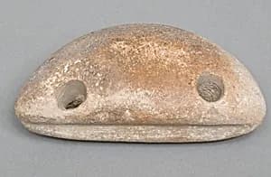 Weighing down device (fish net sinker?) by Unknown Artist
