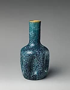 Bottle vase by Linthorpe Pottery Works|Christopher Dresser