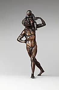 Man Carrying a Child on His Shoulder