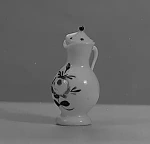 Miniature coffeepot with cover (part of a dollhouse set) by Unknown Artist
