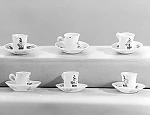 Miniature saucer (part of a dollhouse set) by Unknown Artist
