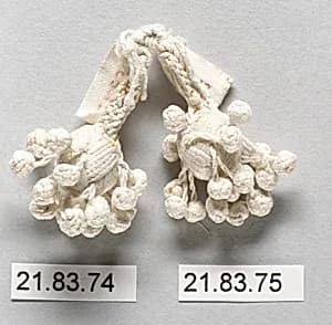 Pair of tassels by Unknown Artist