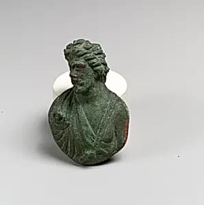 Bronze appliqué in the form of a bust of a barbarian by Unknown Artist