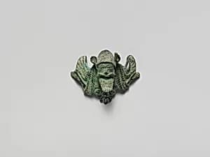 Bronze helmet attachment by Unknown Artist