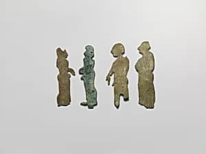 Bronze plaque of a woman by Unknown Artist