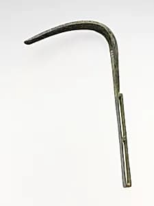 Bronze strigil by Unknown Artist