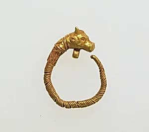 Earring with head of bull by Unknown Artist