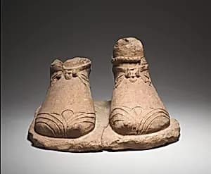 Feet on a plinth by Unknown Artist
