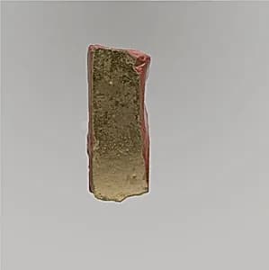 Glass block with gold leaf by Unknown Artist
