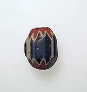 Glass chevron bead by Unknown Artist