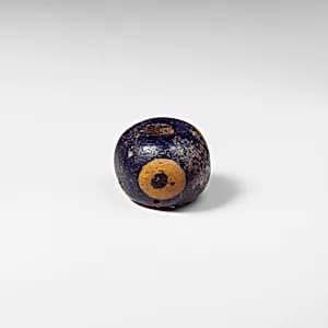 Glass eye bead by Unknown Artist