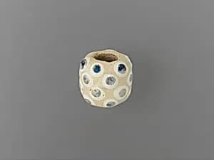 Glass eye bead by Unknown Artist