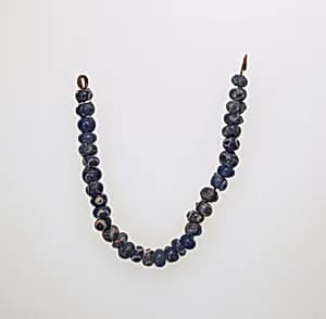 Glass eye beads by Unknown Artist