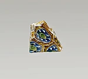 Glass mosaic ribbed bowl fragment by Unknown Artist