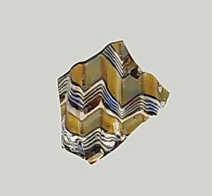 Glass mosaic ribbed bowl fragment by Unknown Artist