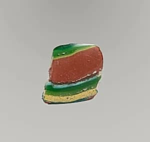 Glass striped mosaic bowl fragment by Unknown Artist