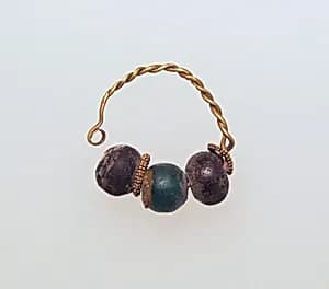 Gold earring with glass beads by Unknown Artist