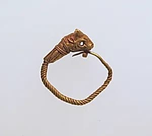 Gold earring with head of a bull by Unknown Artist