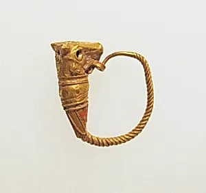 Gold earring with head of a bull by Unknown Artist