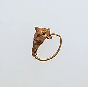 Gold earring with head of a bull by Unknown Artist