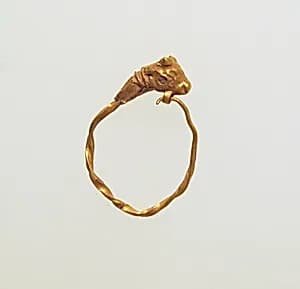 Gold earring with head of a bull by Unknown Artist