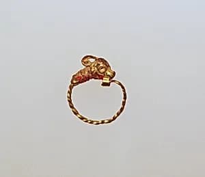 Gold earring with head of an antelope by Unknown Artist