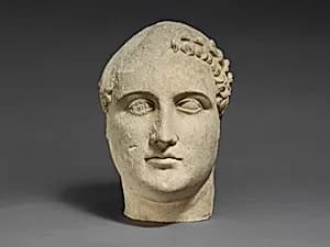 Limestone head of a beardless male votary by Unknown Artist