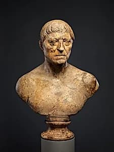 Marble portrait bust of an elderly man by Unknown Artist