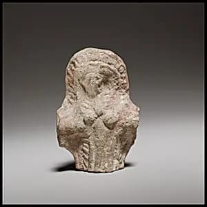Standing female figurine (cruciform) by Unknown Artist