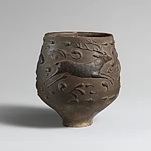 Terracotta cup with barbotine decoration by Unknown Artist