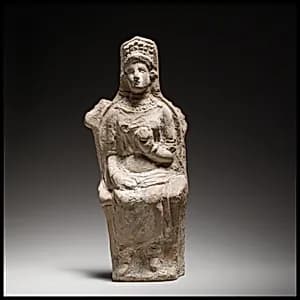 Terracotta figurine of a seated goddess by Unknown Artist