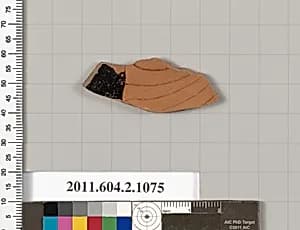 Terracotta fragment of a closed shape by Unknown Artist