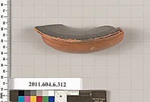 Terracotta fragment of a lamp by Unknown Artist