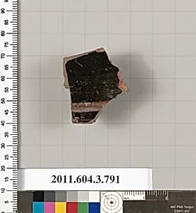 Terracotta fragment of a lid  by Unknown Artist