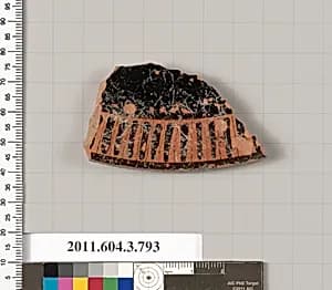 Terracotta fragment of a lid by Unknown Artist