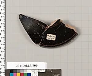 Terracotta fragment of a lid by Unknown Artist