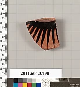 Terracotta fragment of a lid  by Unknown Artist
