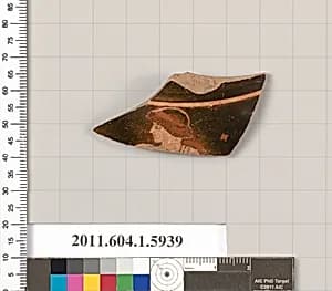 Terracotta fragment of a mastoid? by Unknown Artist