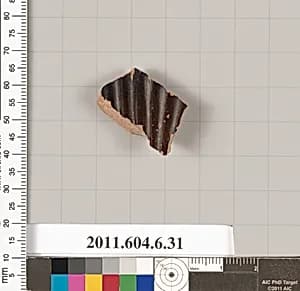 Terracotta fragment of an open shape by Unknown Artist