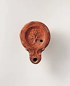 Terracotta oil lamp by Unknown Artist
