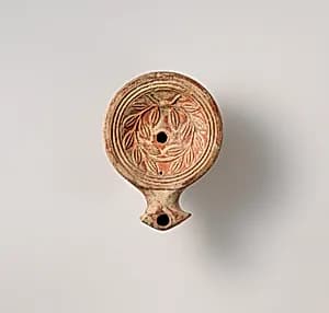 Terracotta oil lamp by Unknown Artist