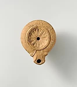 Terracotta oil lamp by Unknown Artist
