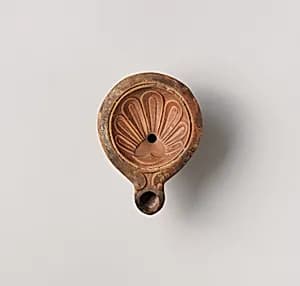 Terracotta oil lamp by Unknown Artist
