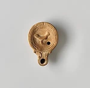 Terracotta oil lamp by Unknown Artist