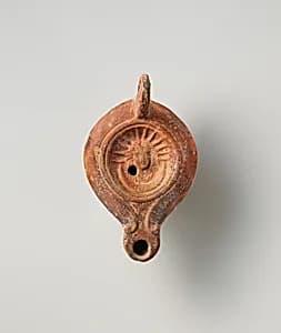 Terracotta oil lamp by Unknown Artist