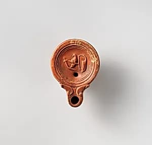 Terracotta oil lamp by Unknown Artist