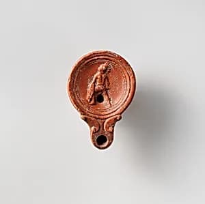 Terracotta oil lamp by Unknown Artist