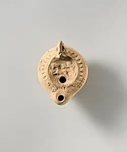 Terracotta oil lamp by Unknown Artist