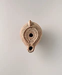 Terracotta oil lamp by Unknown Artist
