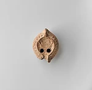 Terracotta oil lamp by Unknown Artist